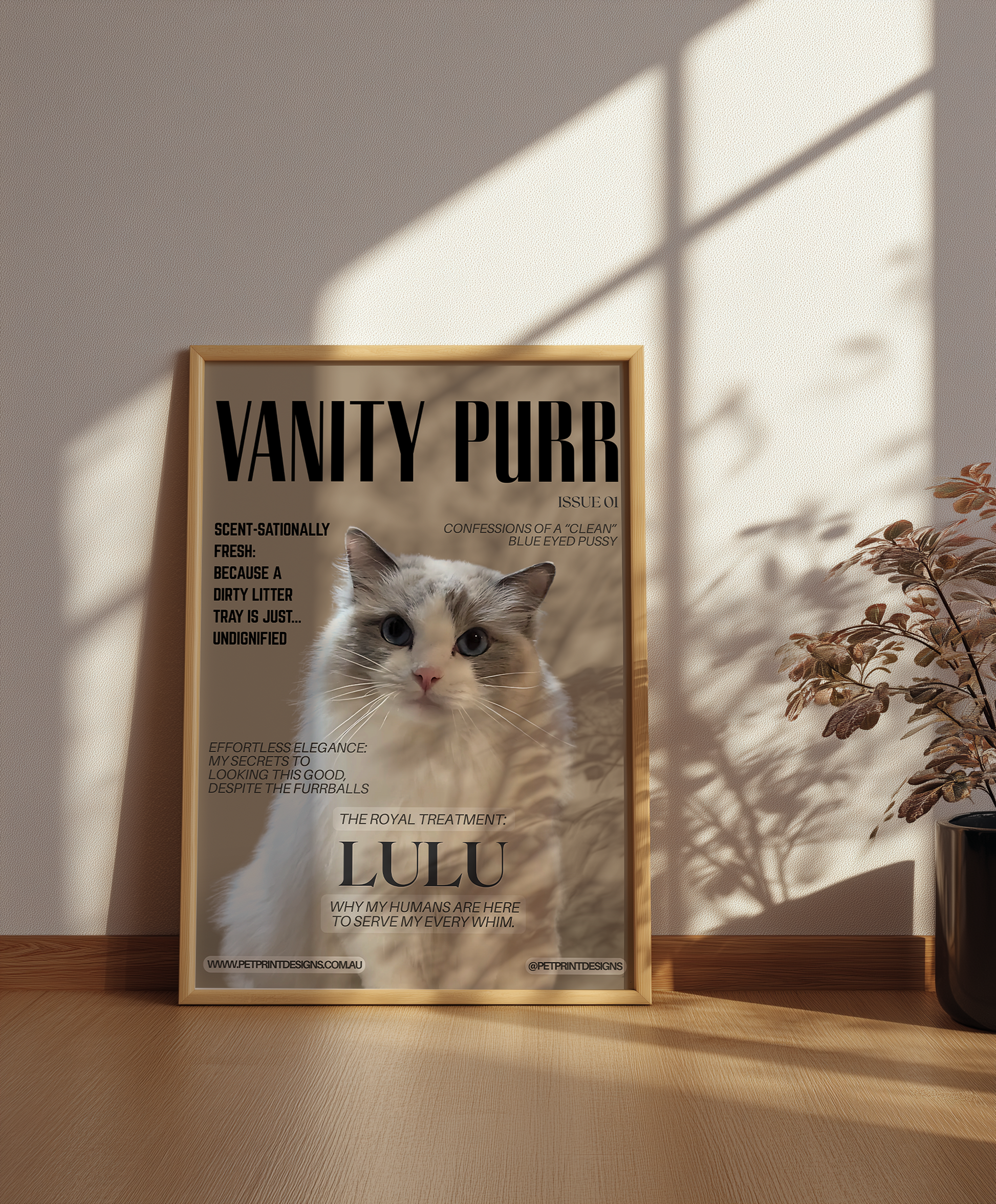 Framed poster of a cat named Lulu with text on a wall.