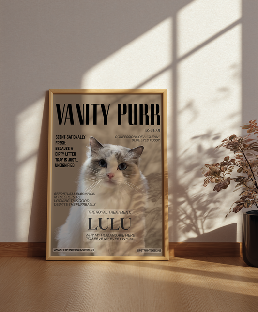 Framed poster of a cat named Lulu with text on a wall.